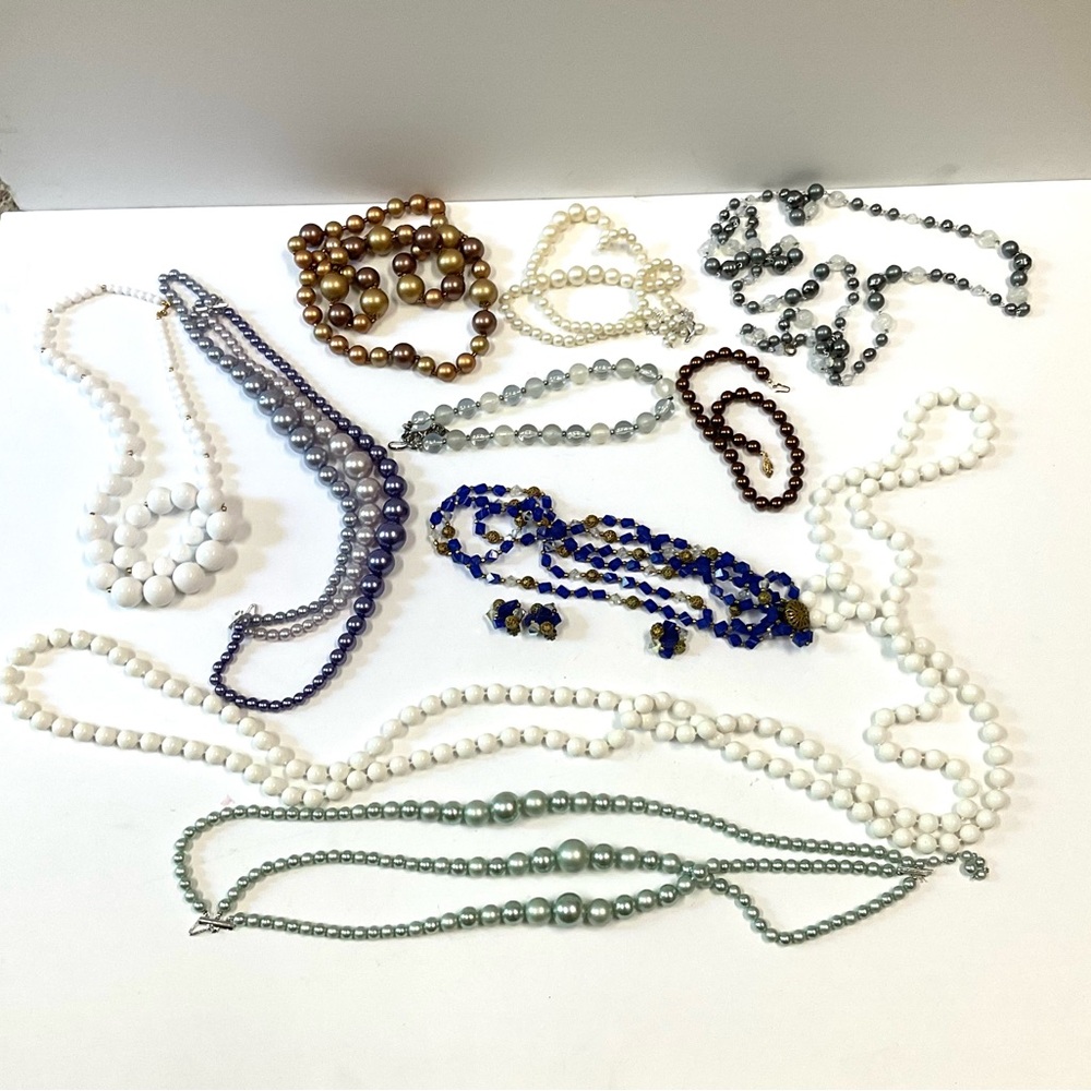 Ten vintage bead necklaces.  Fun, props, theatrical, dress-up.